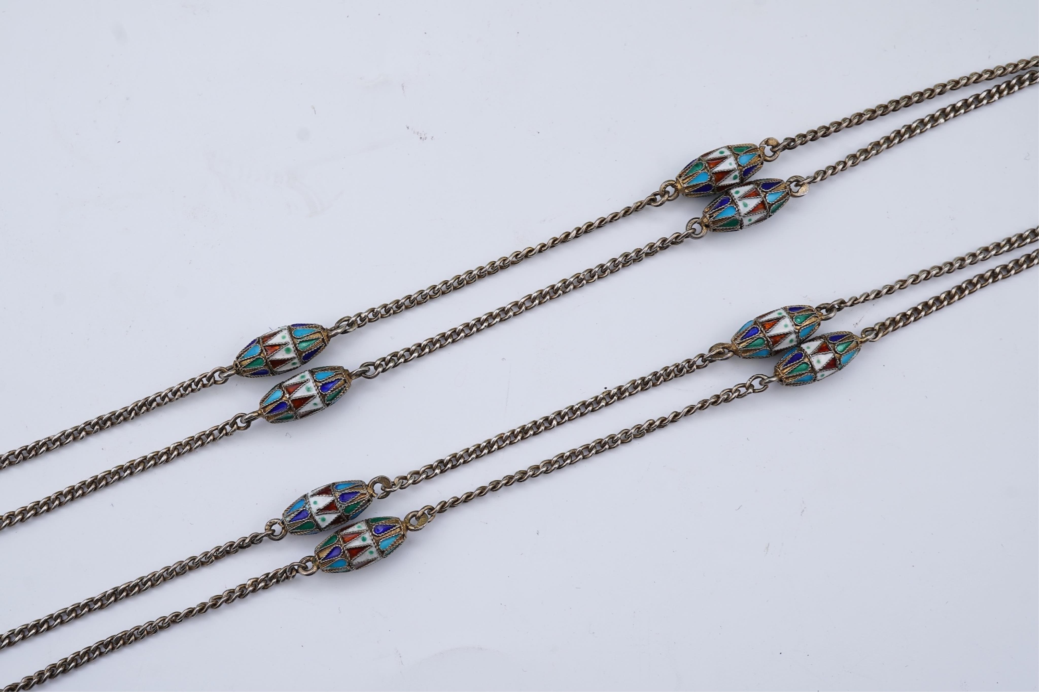 A silver and enamel long chain necklace, Russia, early 20th century